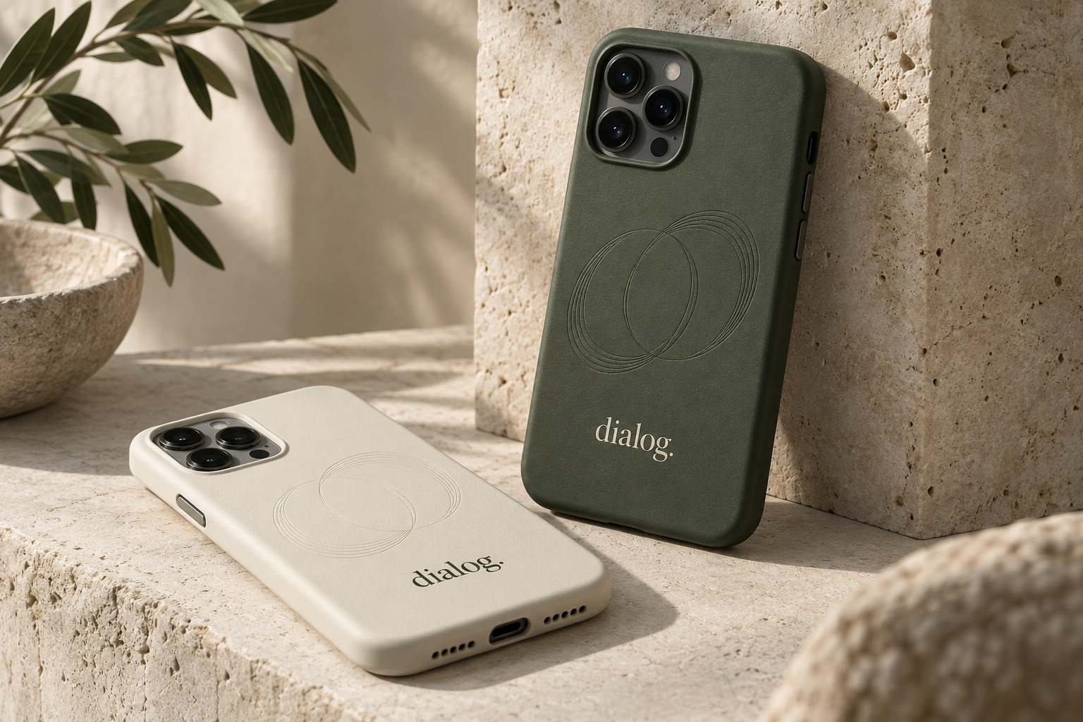 Olive and ivory phone cases with a quiet Dialog wordmark and an embossed contour motif.